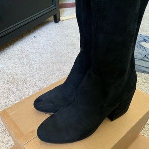 Thigh high black boots